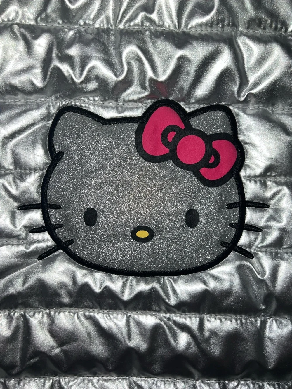 Hello Kitty Metallic Silver Quilted Puffer Vest with Pink Bow Patch